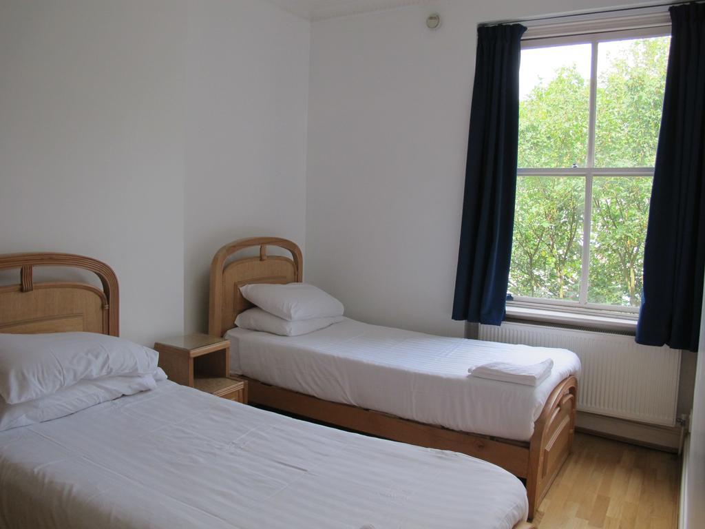 Ferienwohnung Access Earls Court London Zimmer foto